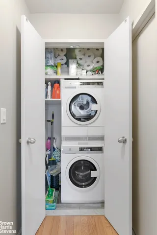 a bathroom with a bathtub a sink a toilet a mirror and shower