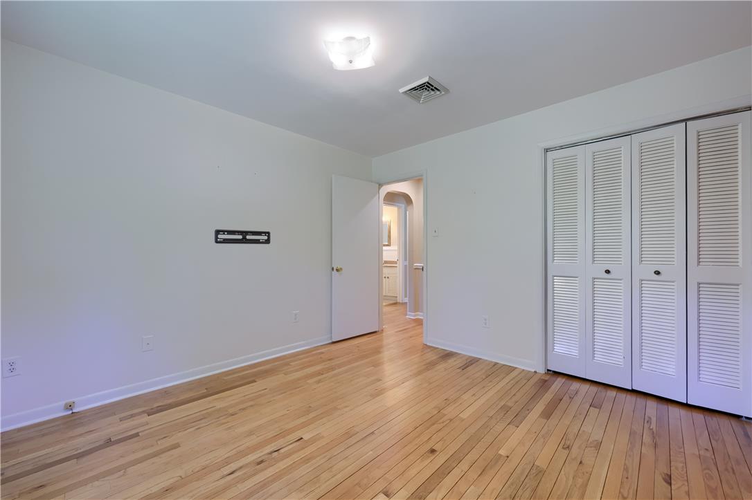 Coldsprings Rd Union Pottstown, PA 19465 - Photo 60 of 71 A well-lit bedroom with gleaming hardwood floors offers a clean, open space ready for personalization.
