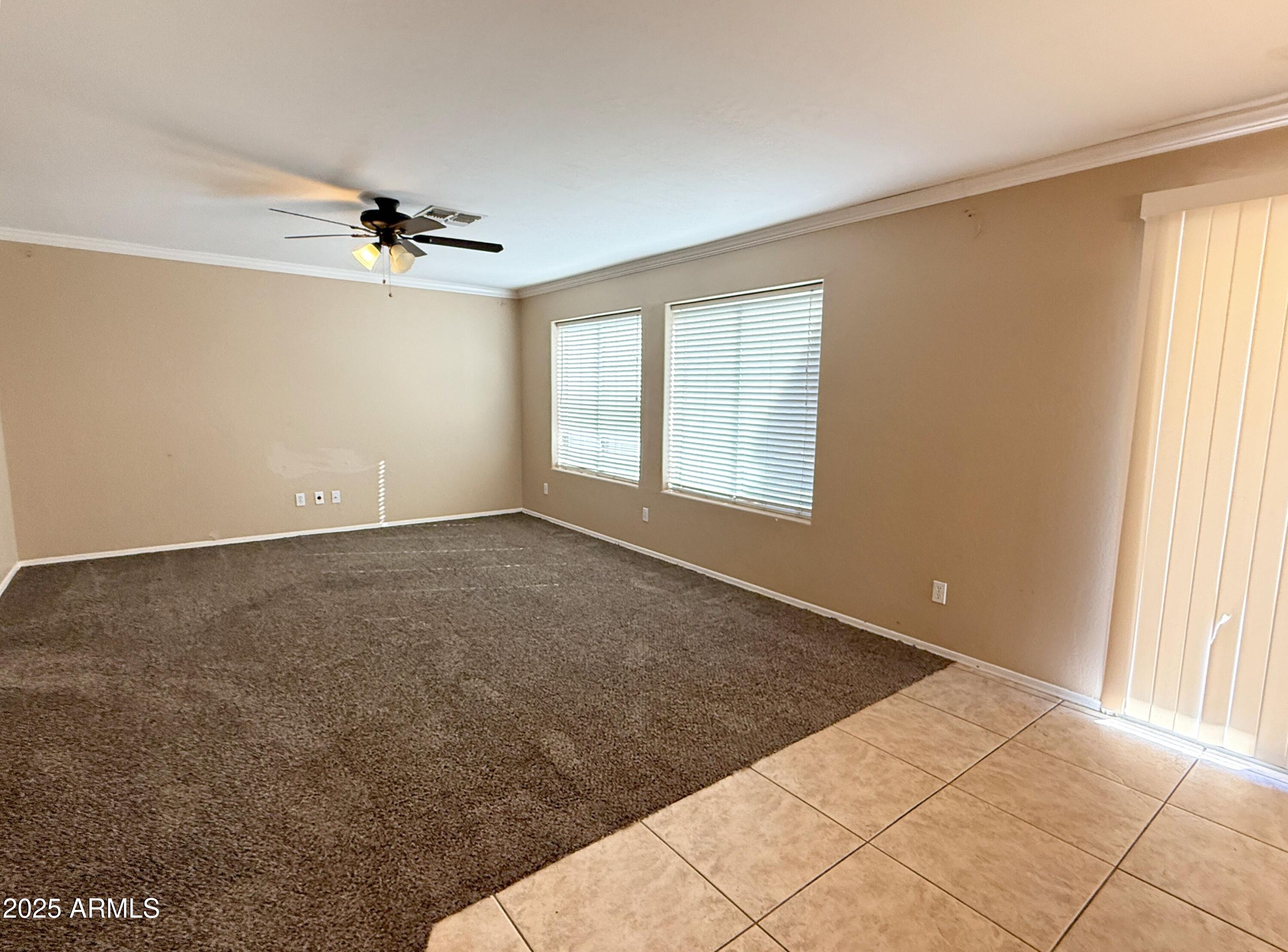 3363 East Flamingo Court Gilbert, AZ 85297 - Photo 11 of 29 a view of an empty room with a window