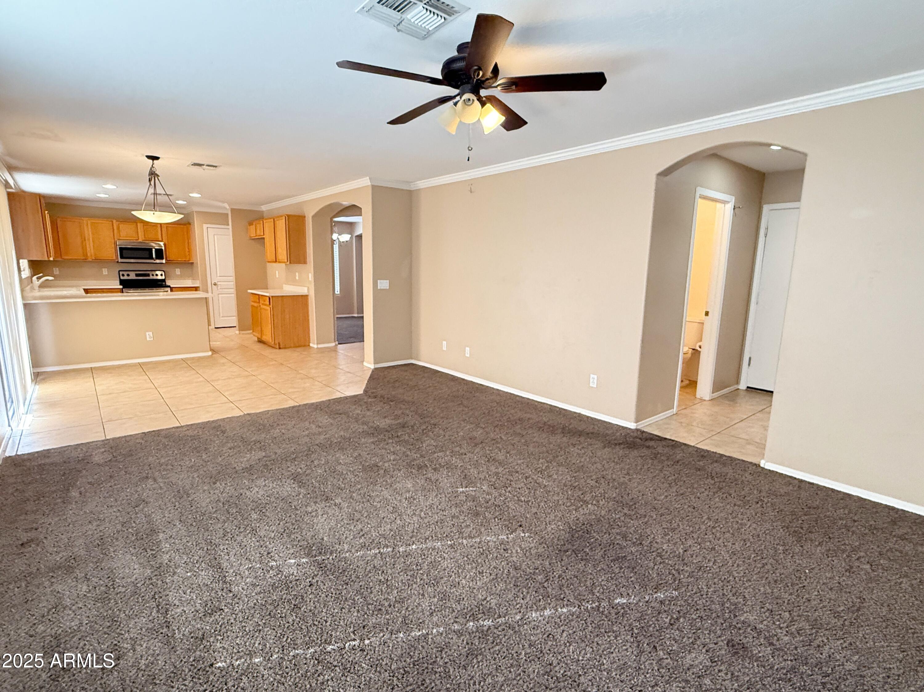 3363 East Flamingo Court Gilbert, AZ 85297 - Photo 13 of 29 a view of a livingroom with a kitchen