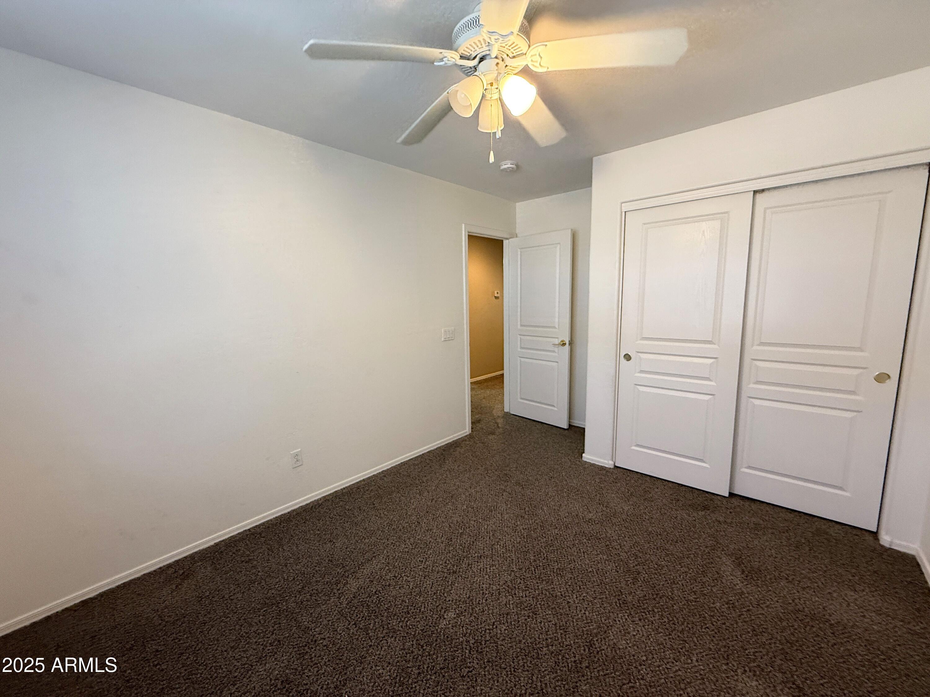 3363 East Flamingo Court Gilbert, AZ 85297 - Photo 23 of 29 an empty room with closet area