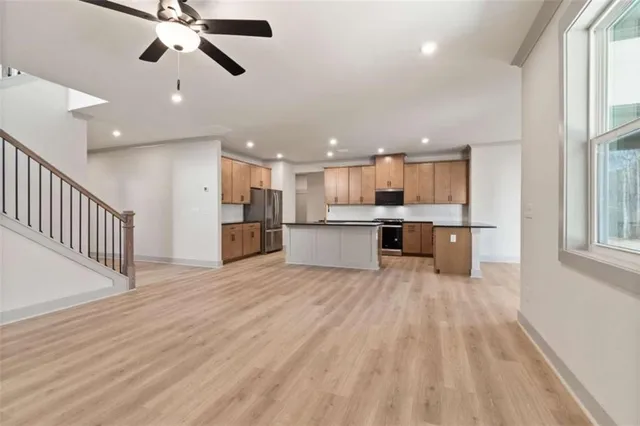 a view of a kitchen with a sink and an oven
