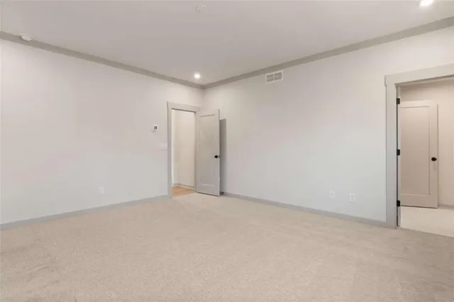 a bathroom with a bathtub sink and mirror