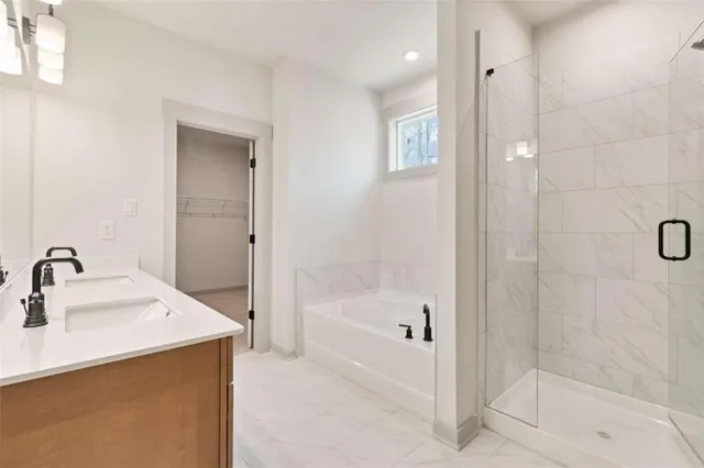 a bathroom with a sink a light fixture a vanity and a mirror