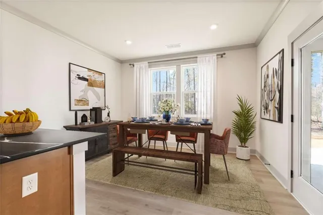 a view of a livingroom with furniture and window