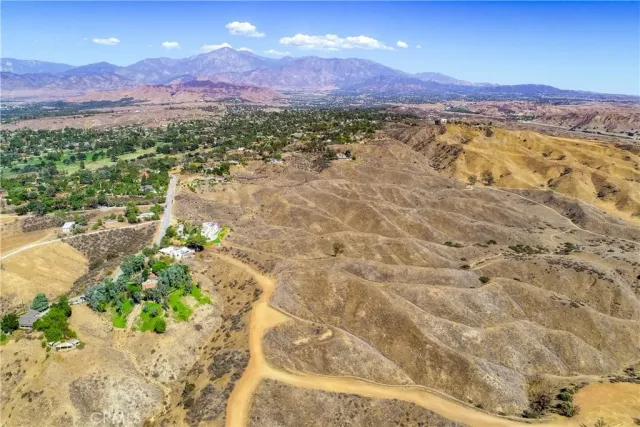a view of a city with mountains in the background