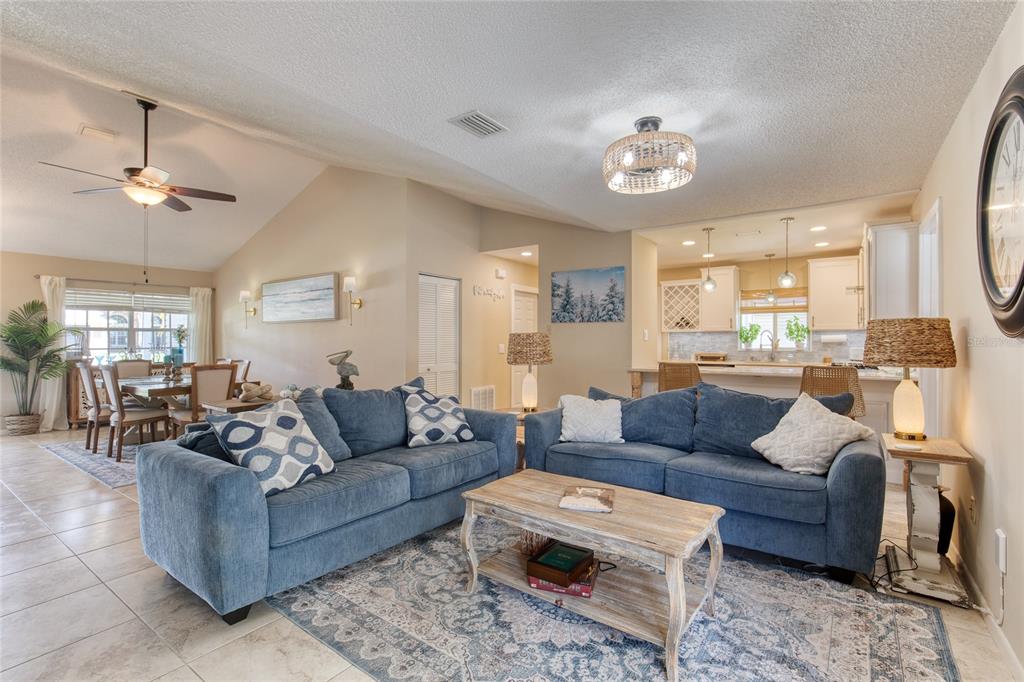 23 Fallon Lane Palm Coast, FL 32137 - Photo 11 of 77 a living room with furniture and a view of kitchen
