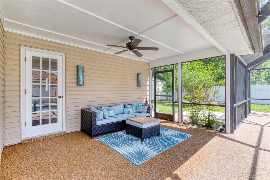 23 Fallon Lane Palm Coast, FL 32137 - Photo 45 of 77 a living room with furniture and a large window