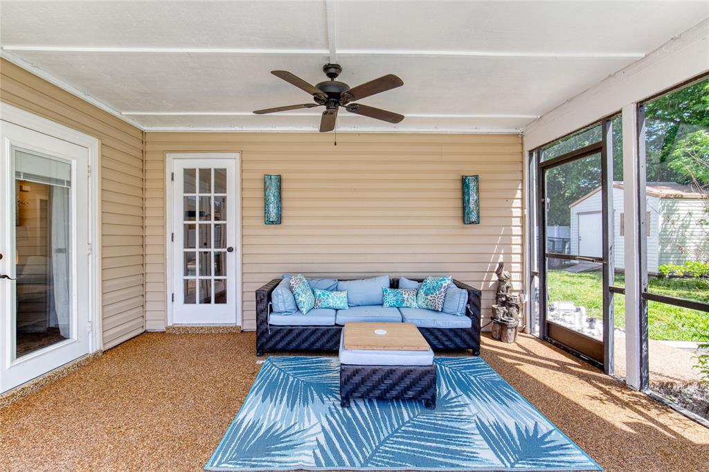 23 Fallon Lane Palm Coast, FL 32137 - Photo 47 of 77 a living room with furniture and a large window