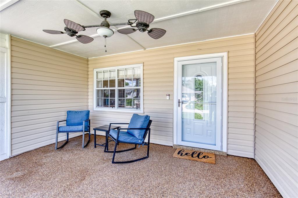 23 Fallon Lane Palm Coast, FL 32137 - Photo 59 of 77 a view of a livingroom with furniture and a ceiling fan