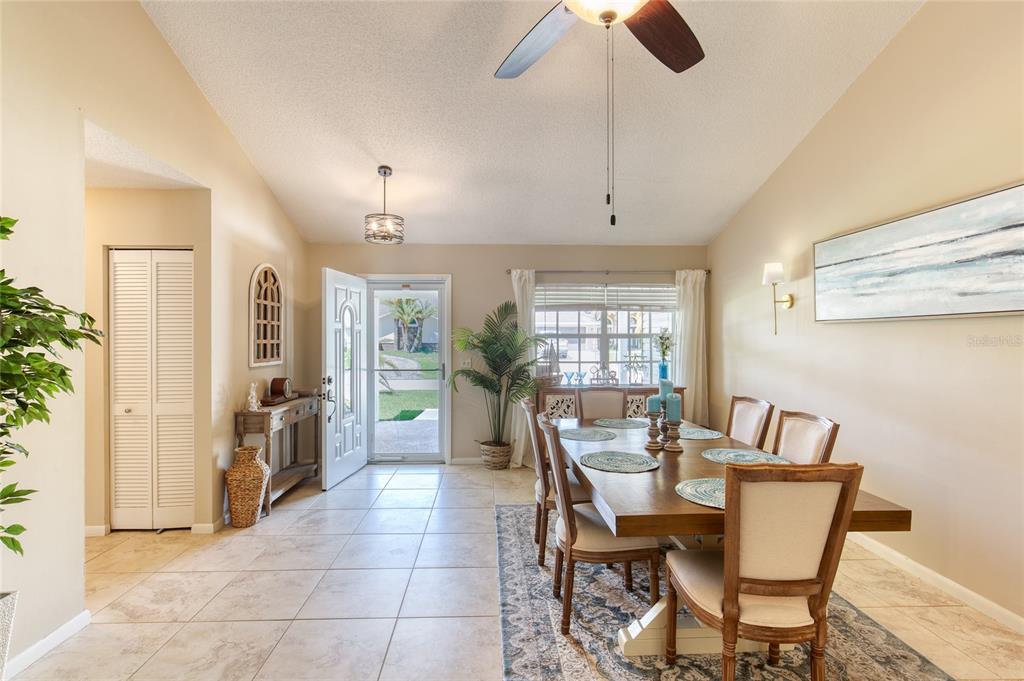 23 Fallon Lane Palm Coast, FL 32137 - Photo 6 of 77 a view of a dining room with furniture and window