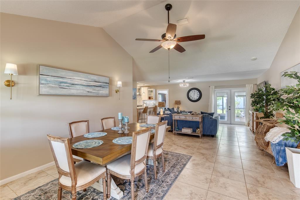 23 Fallon Lane Palm Coast, FL 32137 - Photo 7 of 77 a living room with furniture and a table