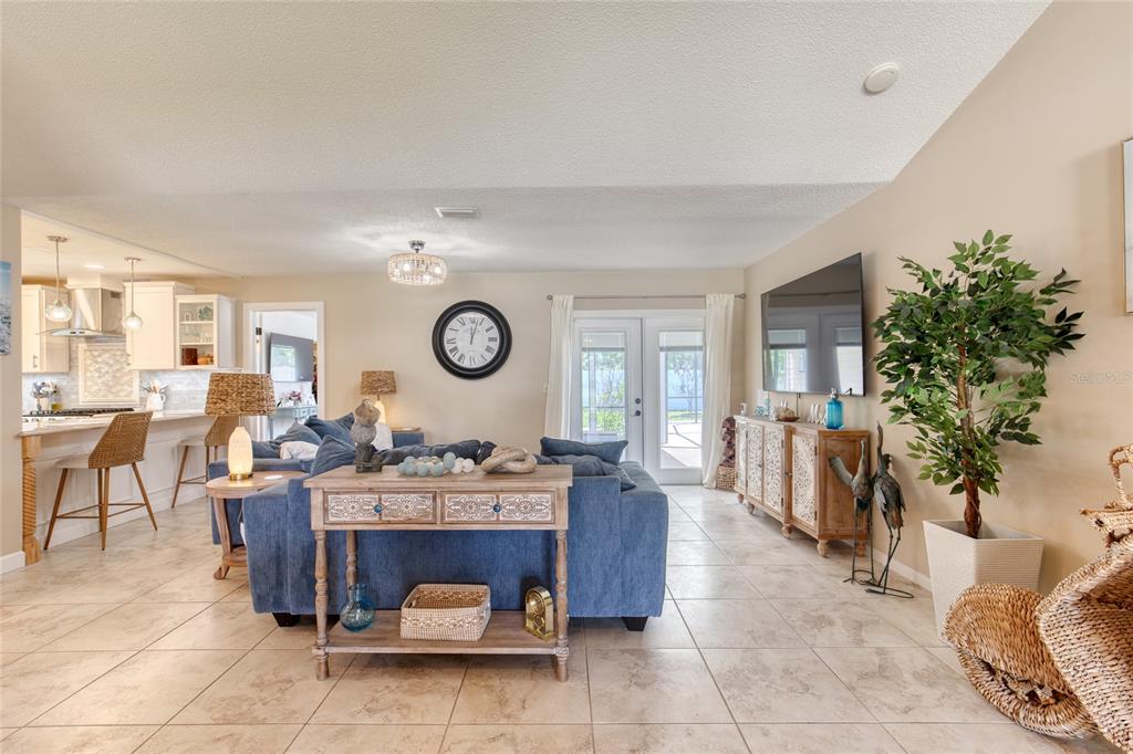 23 Fallon Lane Palm Coast, FL 32137 - Photo 9 of 77 a living room with furniture and a clock