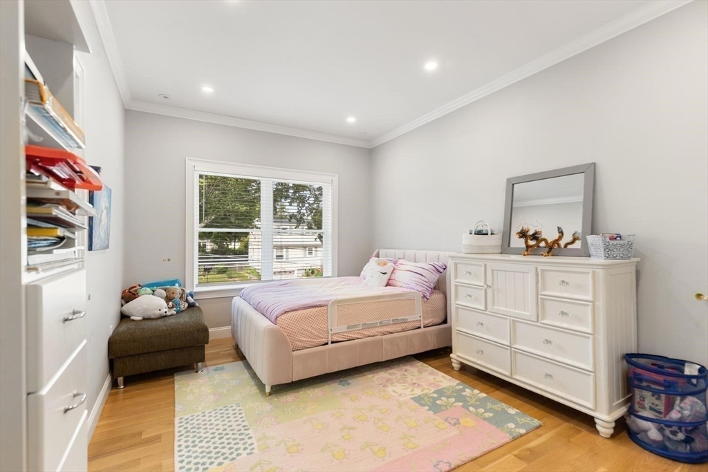 155 Adams Avenue Newton, MA 02465 - Photo 27 of 37 a bedroom with a bed and a window