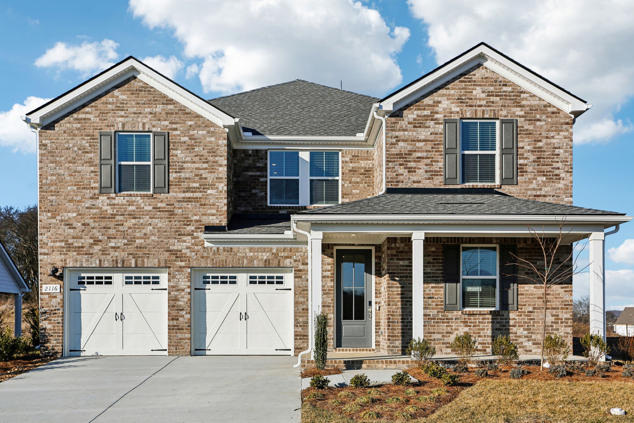 2116 Riley Pk Drive Franklin, TN 37064 - Photo 1 of 47 front view of a house with a yard