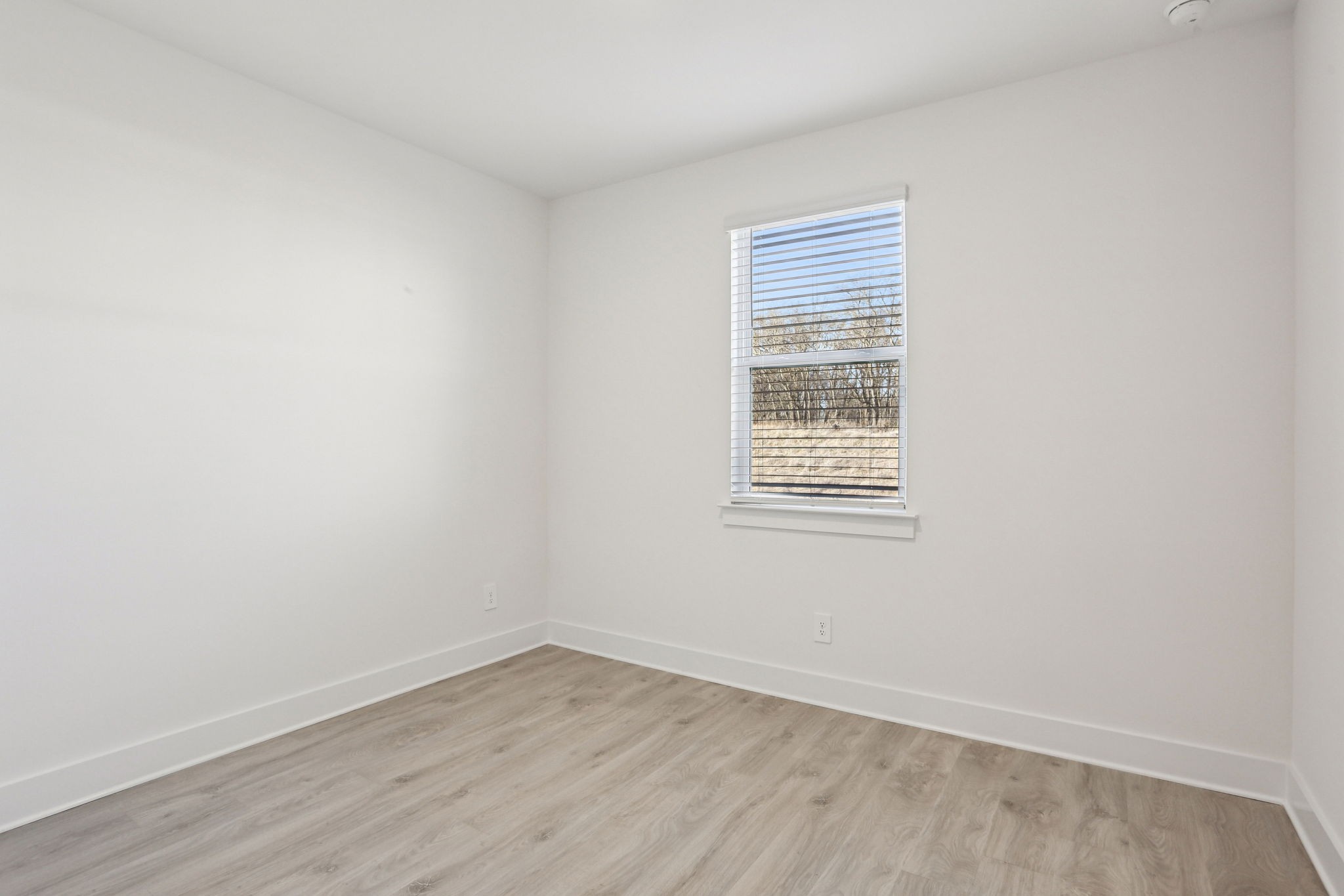 2116 Riley Pk Drive Franklin, TN 37064 - Photo 15 of 47 wooden floor in an empty room with a window