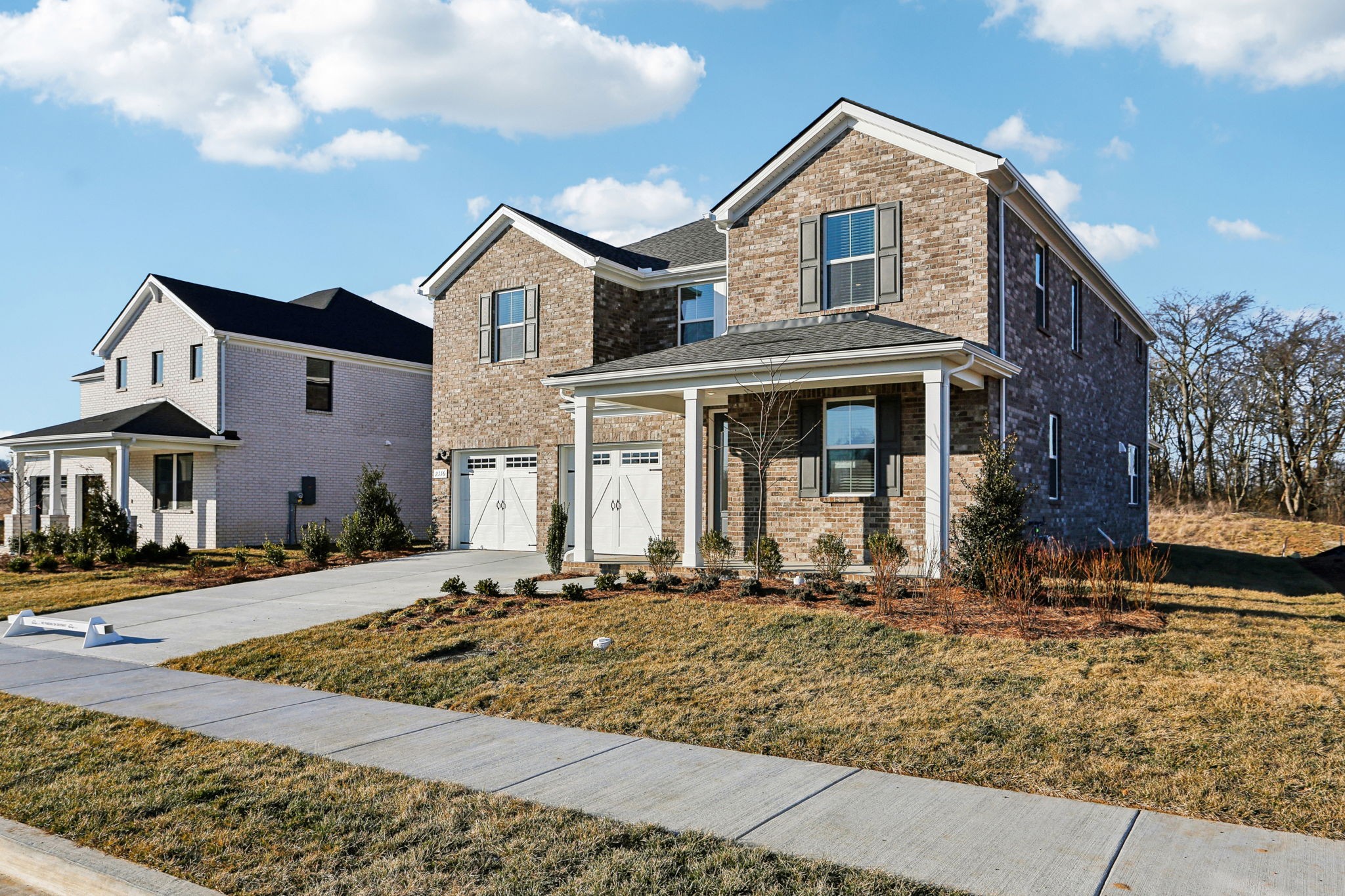 2116 Riley Pk Drive Franklin, TN 37064 - Photo 3 of 47 a front view of a house with a yard