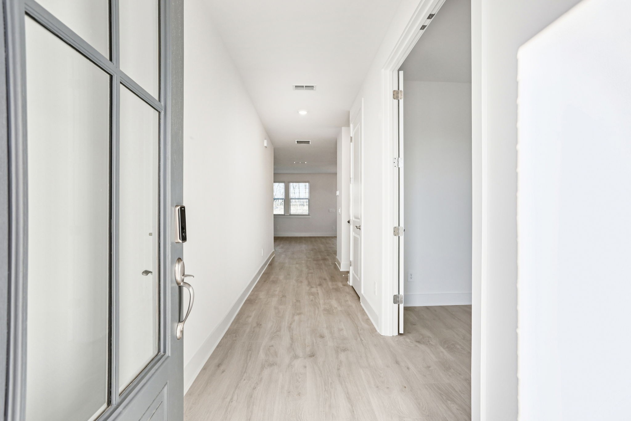 2116 Riley Pk Drive Franklin, TN 37064 - Photo 4 of 47 a view of a hallway with wooden floor
