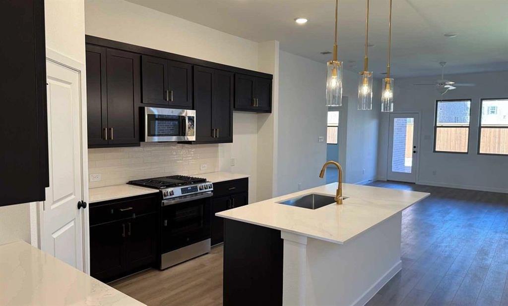 14157 Gallatin Street Pilot Point, TX 76258 - Photo 13 of 23 Kitchen Construction Progress featuring the Oxford Collection