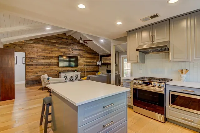a kitchen with a sink and window
