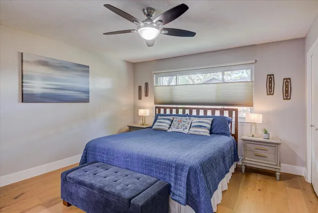 a dining room with a table and chairs