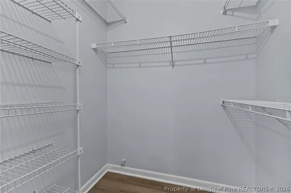 a view of a room with racks on the wall