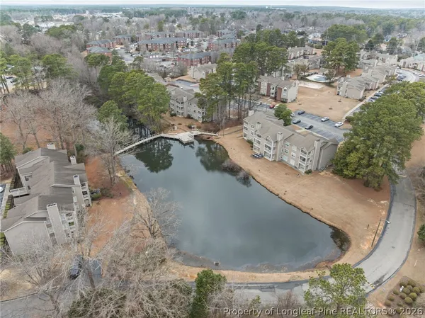 a view of a lake with a sitting area