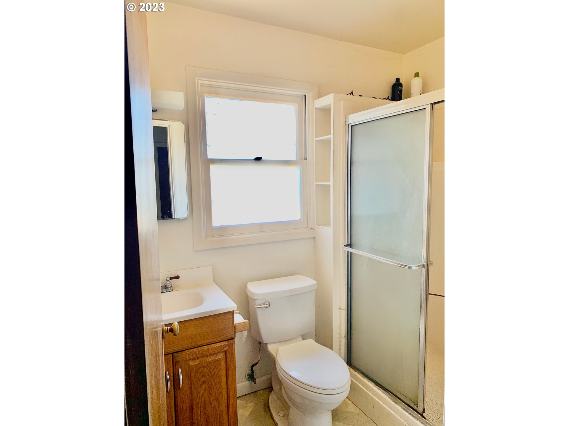 689 East 3rd Avenue Riddle, OR 97469 - Photo 15 of 17 a white toilet sitting next to a bathroom sink