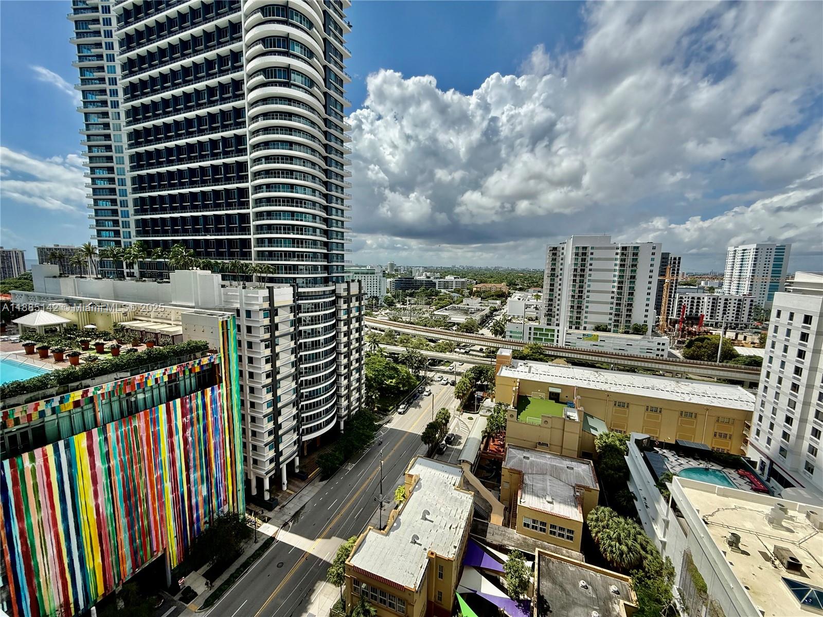 1250 South Miami Avenue, Unit 1603 Miami, FL 33130 - Photo 35 of 44 a view of a balcony with chairs