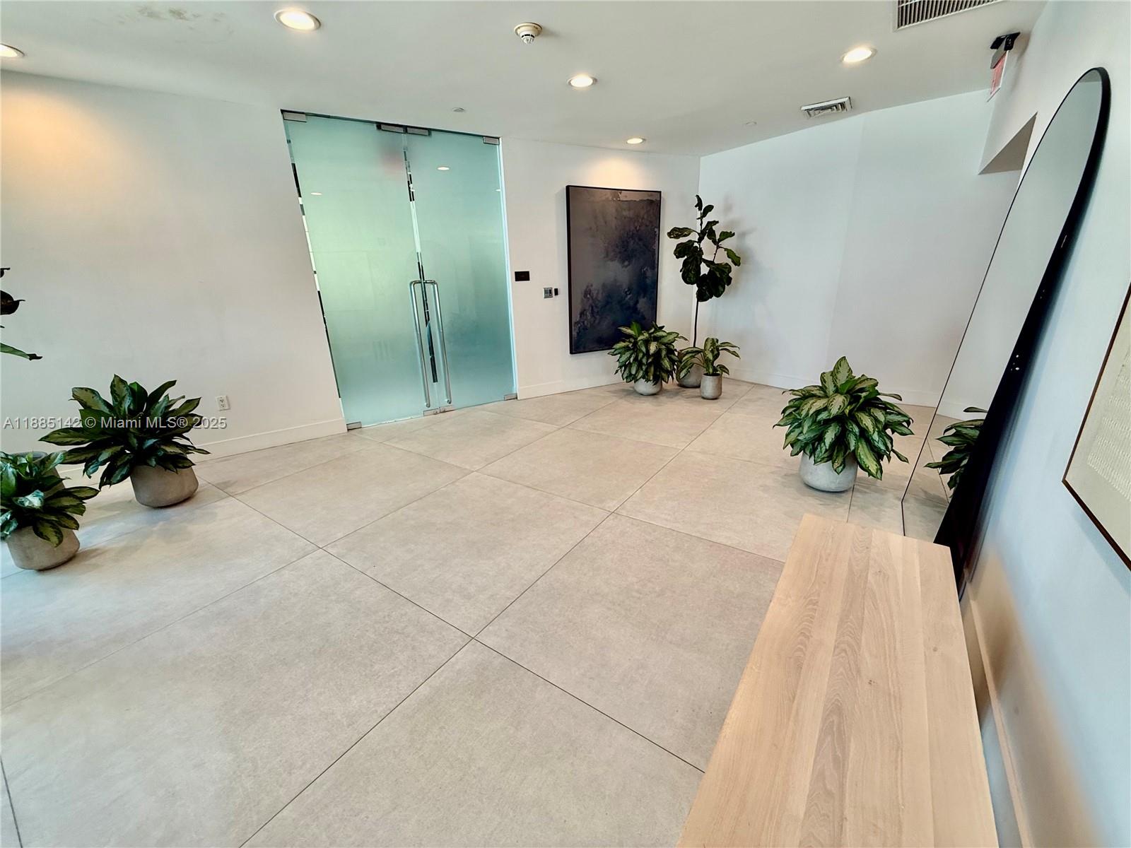 1250 South Miami Avenue, Unit 1603 Miami, FL 33130 - Photo 8 of 44 a view of entryway with wooden floor