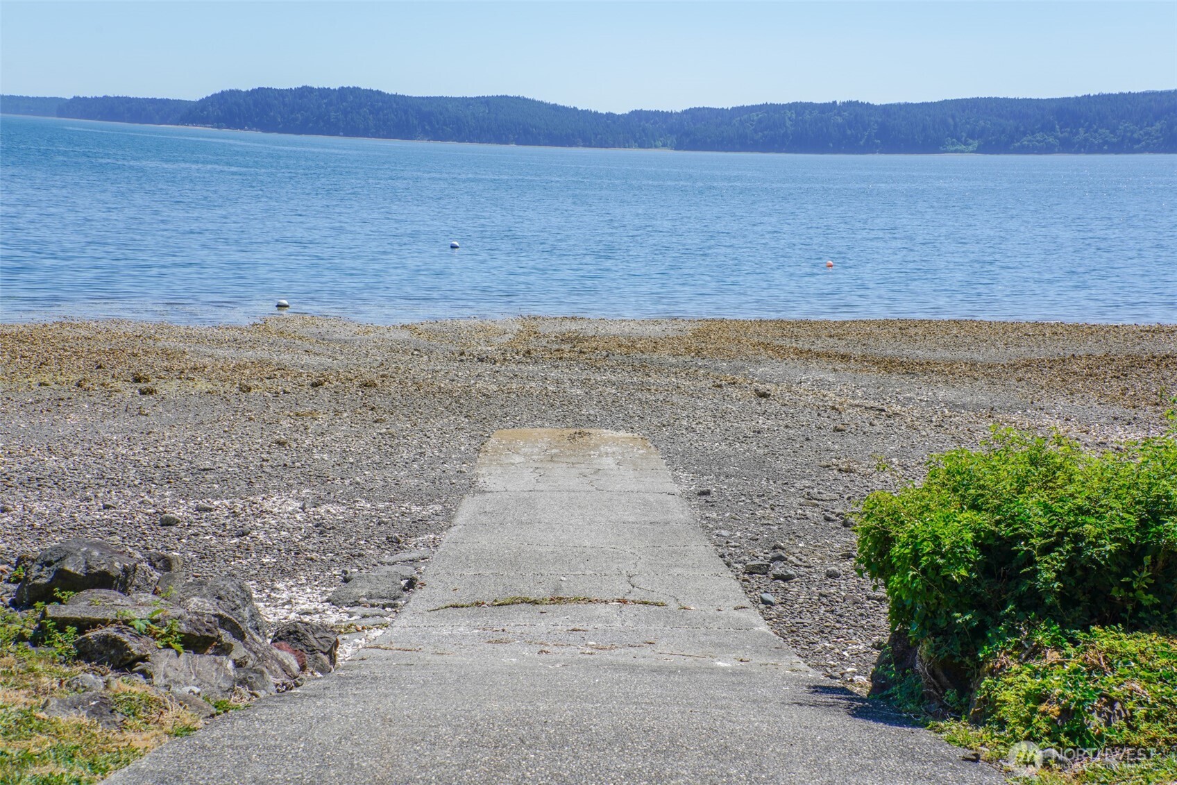 0 Maple Avenue Brinnon, WA 98320 - Photo 8 of 9 a view of an ocean beach and mountain