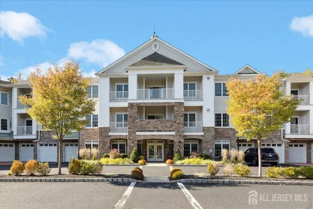 a front view of a building with street view