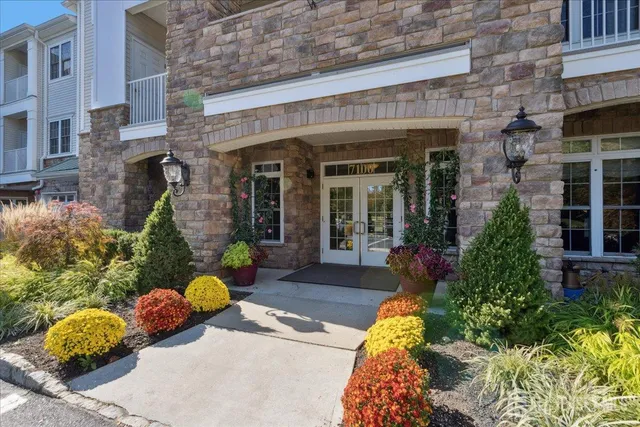 a view of a hallway with windows