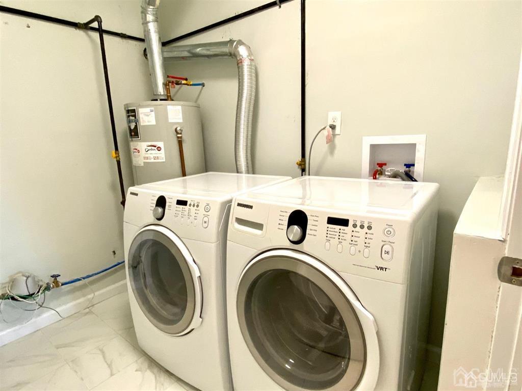 23 Springdale Road Kendall Park, NJ 08824 - Photo 18 of 26 a utility room with dryer and washer