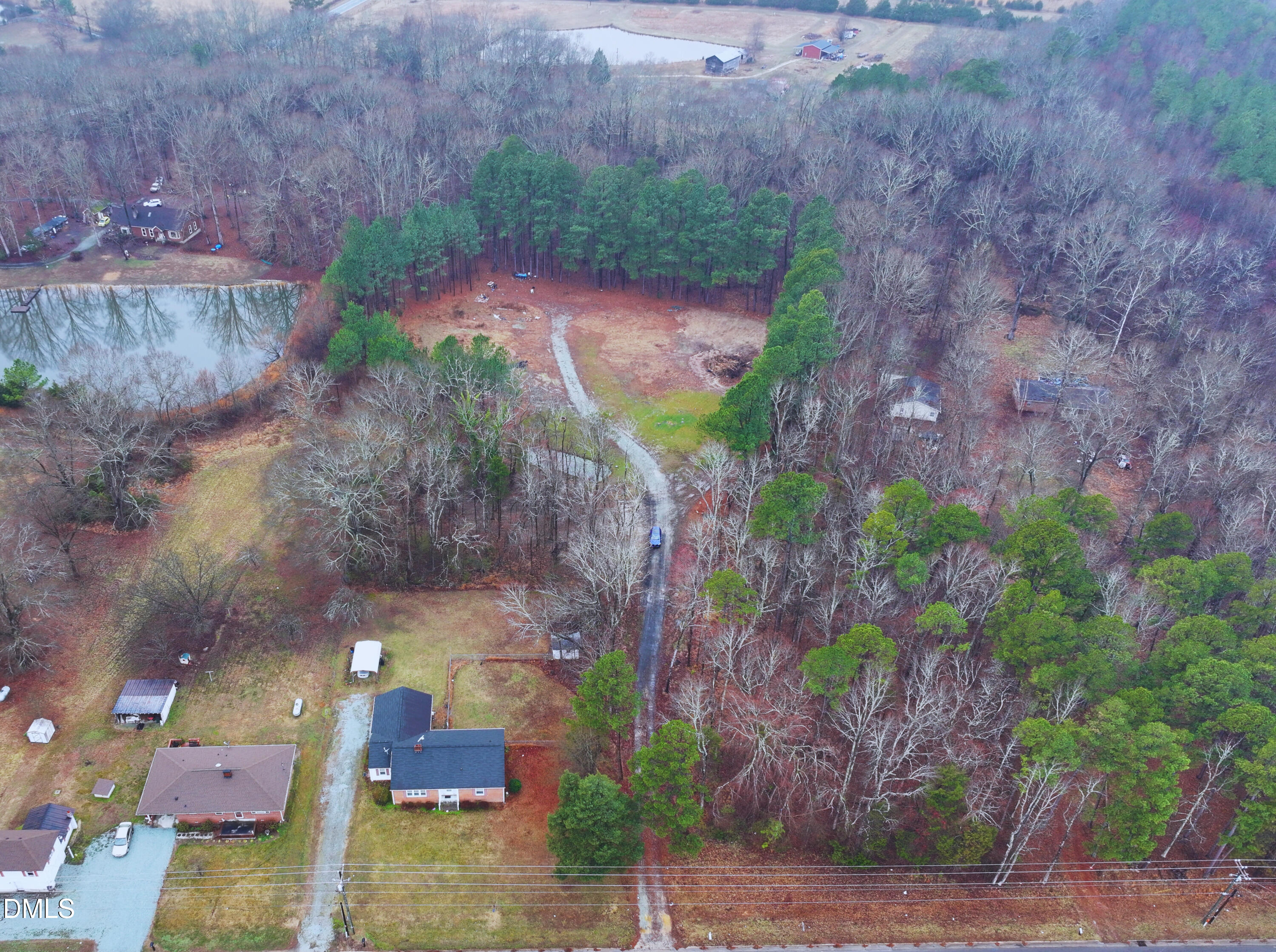 13205 North Roxboro Street Rougemont, NC 27572 - Photo 2 of 2 a backyard of a house with lots of green space