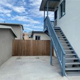 a view of a staircase with wooden walls and stairs
