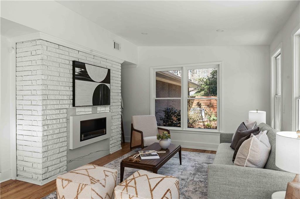 2576 River Oak Drive Decatur, GA 30033 - Photo 14 of 47 a living room with furniture and a fireplace