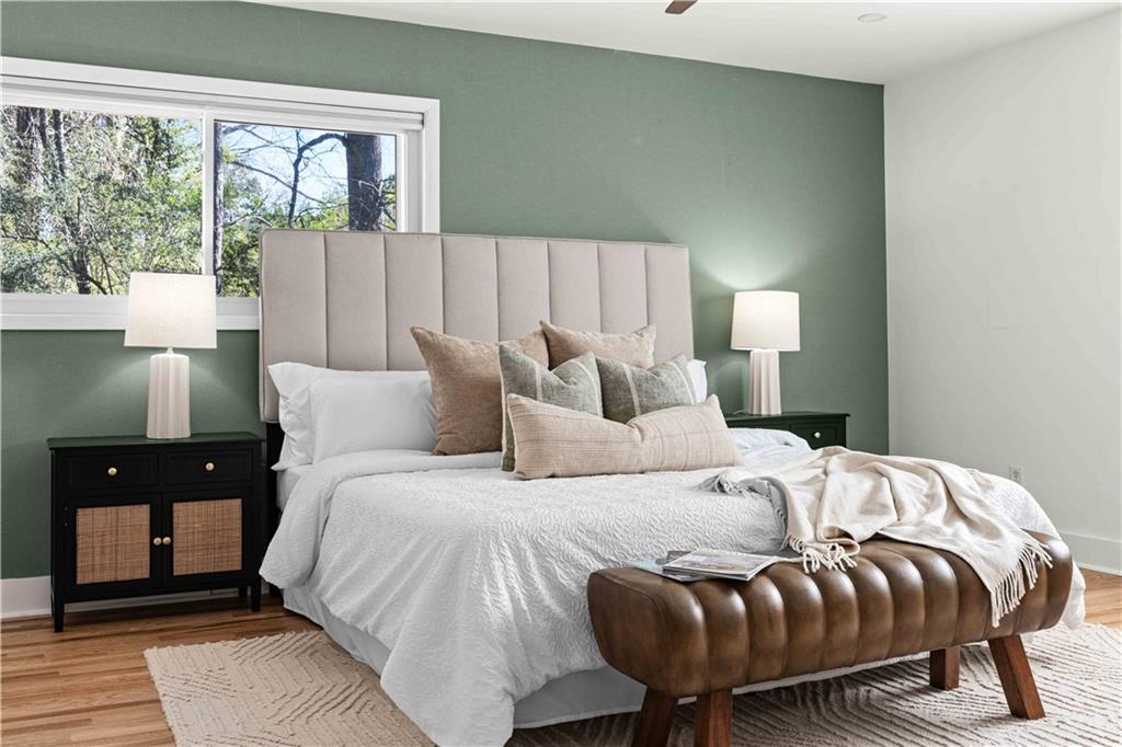 2576 River Oak Drive Decatur, GA 30033 - Photo 16 of 47 a bedroom with a bed and wooden floor