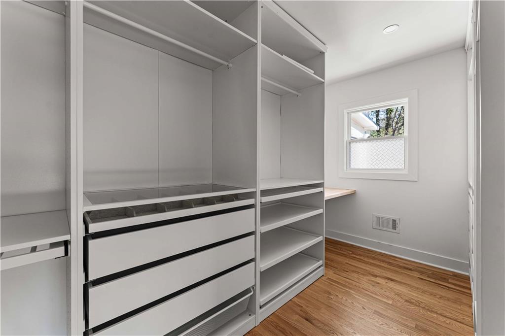 2576 River Oak Drive Decatur, GA 30033 - Photo 18 of 47 a view of walk in closet with empty racks
