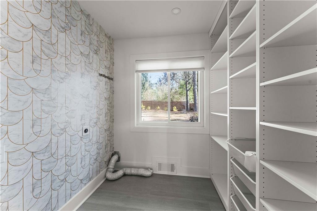2576 River Oak Drive Decatur, GA 30033 - Photo 30 of 47 a bathroom with a window and a shower