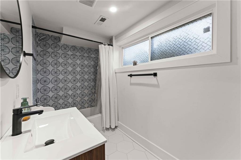 2576 River Oak Drive Decatur, GA 30033 - Photo 37 of 47 a bathroom with a sink and a shower