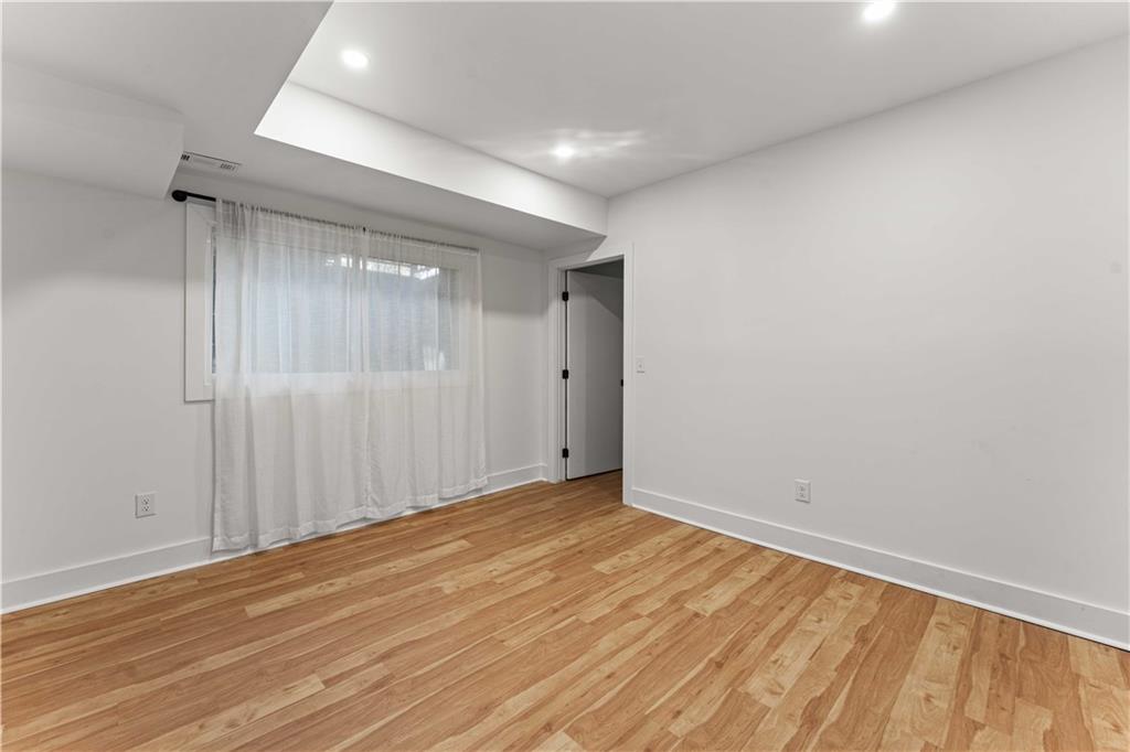 2576 River Oak Drive Decatur, GA 30033 - Photo 38 of 47 a view of an empty room with wooden floor