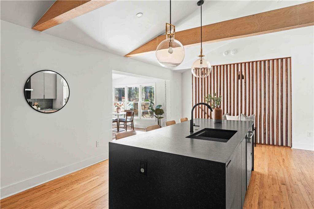 2576 River Oak Drive Decatur, GA 30033 - Photo 10 of 47 a kitchen with stainless steel appliances granite countertop a sink a stove and a wooden floors