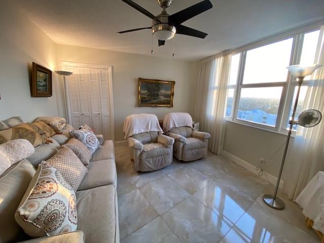 1340 South Ocean Boulevard, Unit 1509 Pompano Beach, FL 33062 - Photo 4 of 14 a living room with furniture and a window