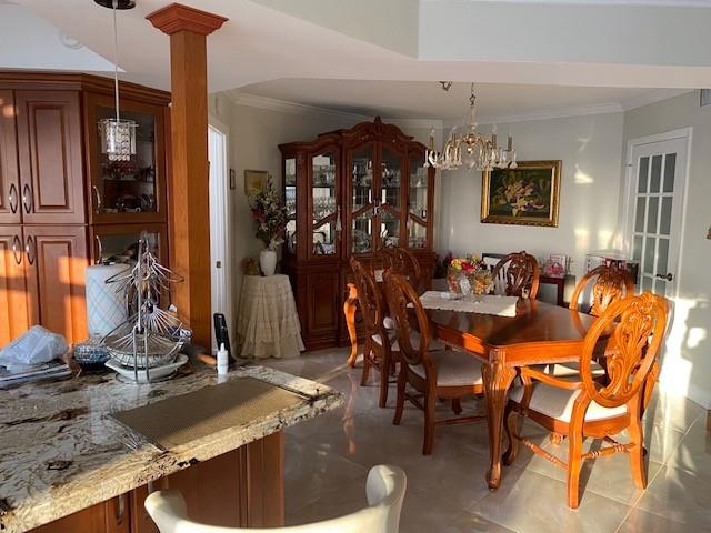 1340 South Ocean Boulevard, Unit 1509 Pompano Beach, FL 33062 - Photo 10 of 14 a view of a dining room with furniture