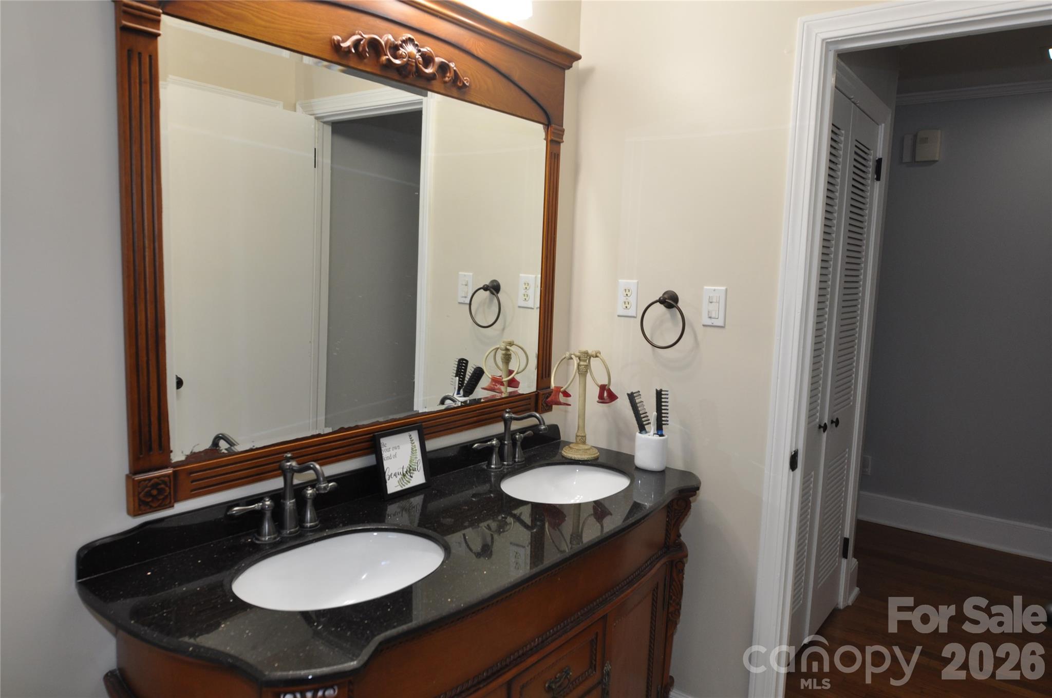 109 Shamrock Drive Chester, SC 29706 - Photo 23 of 38 a bathroom with a sink and a mirror