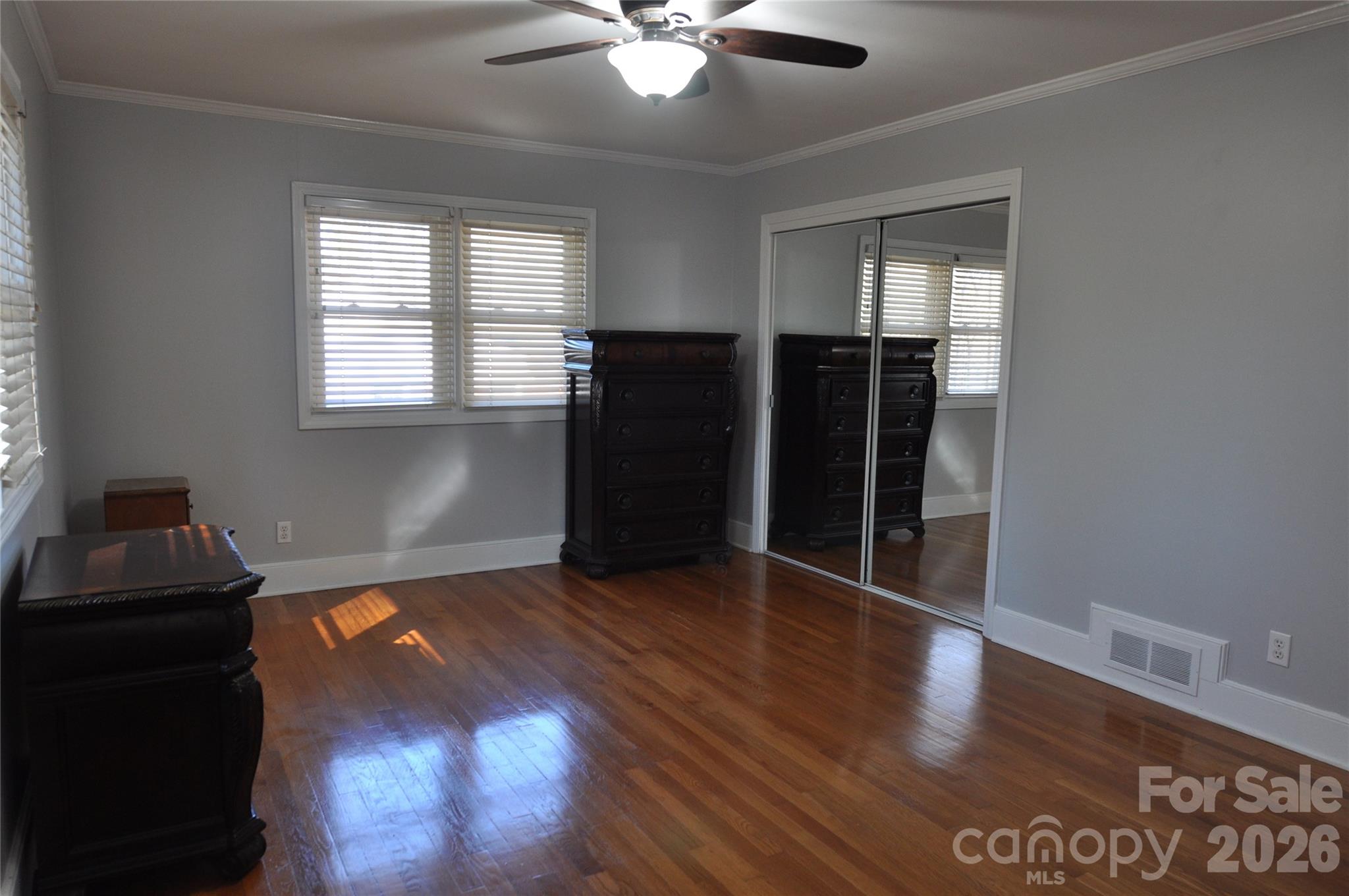 109 Shamrock Drive Chester, SC 29706 - Photo 28 of 38 a view of an empty room with wooden floor and a window