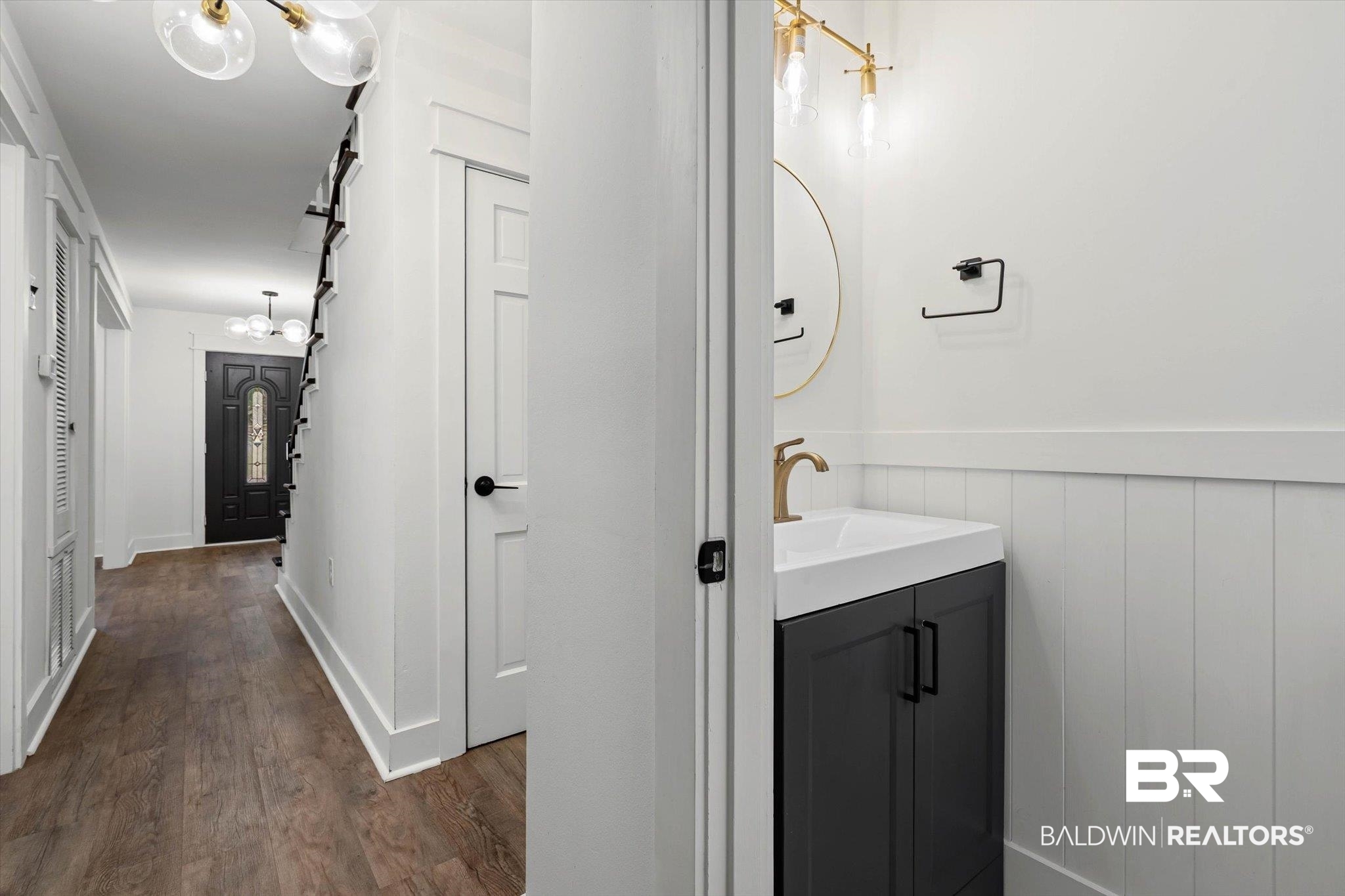 3933 Radnor Avenue Mobile, AL 36608 - Photo 13 of 36 Half bath with vanity and dark wood-style flooring