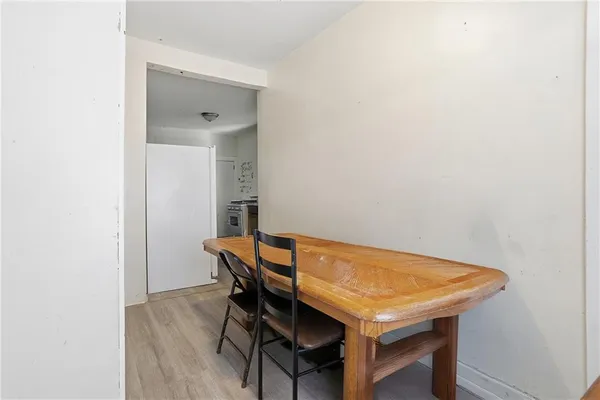 a view of a room with table and chair