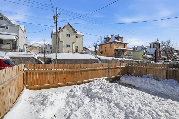 a front view of a house with swimming pool